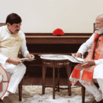 CM Dr. Mohan Yadav presenting a bouquet to PM Narendra Modi in Delhi Parliament House