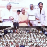 CM Yogi Adityanath distributing appointment letters to nursing officers at RMLIMS Lucknow